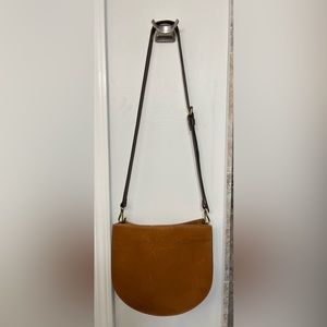 Madewell The Transport Saddle Bag. Two straps included; canvas and leather.